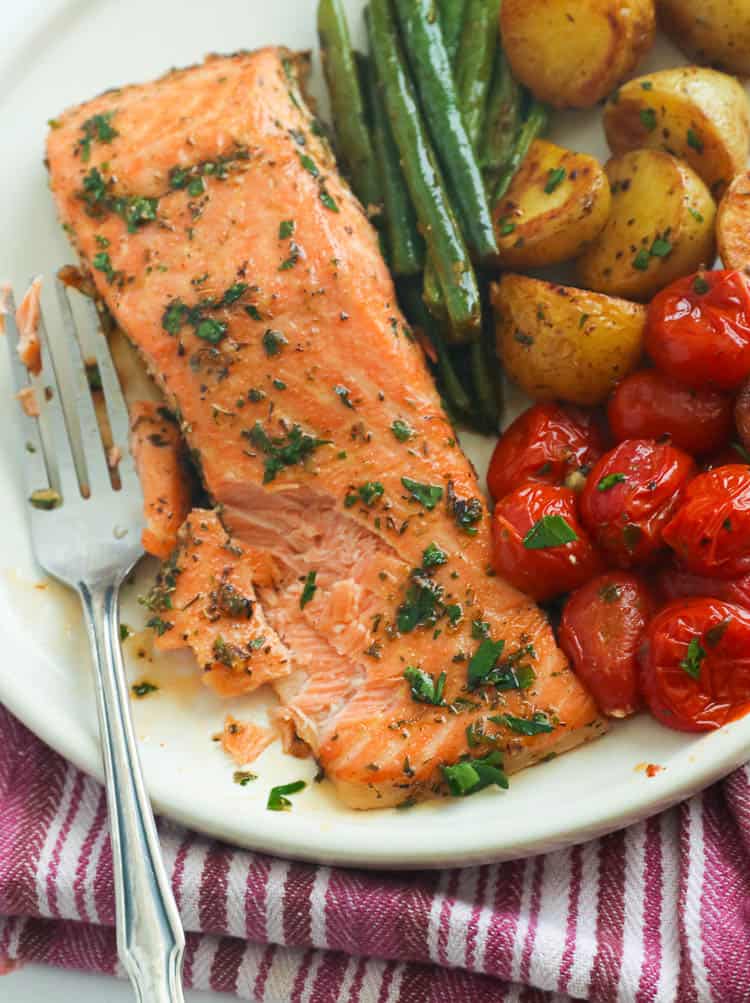 A Serving of Cajun Salmon and Vegetables on a Plate