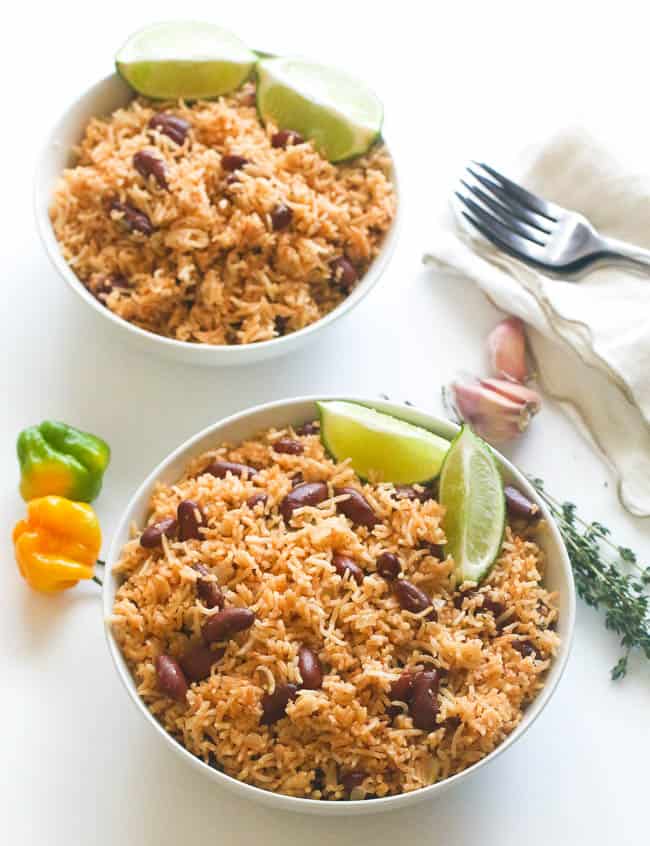 Enjoying Caribbean rice and beans with lime wedges