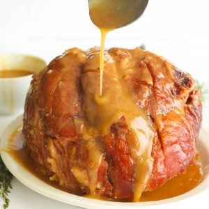 A Slow Cooker Whole Ham glazed with Honey mixture